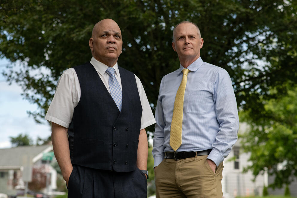 Cortez Hopkins and Doug Galuszka standing with their hands in their pockets