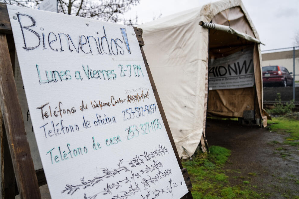 A sign greets detainees at the AIDNW Welcome Center