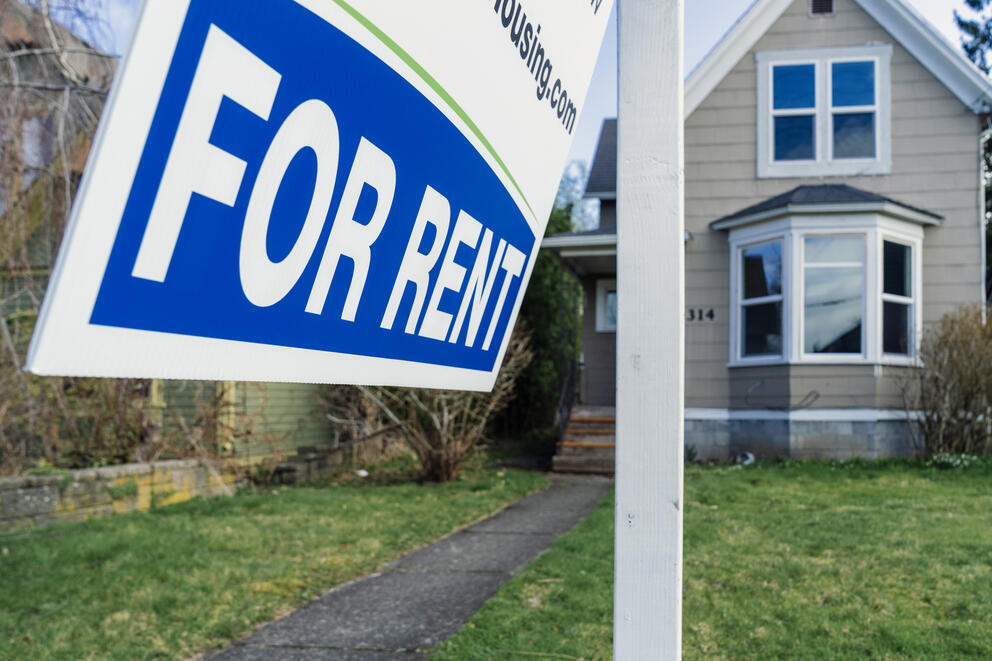A for rent sign outside a home