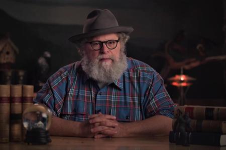 Mossback in a grey hat