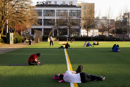 park goers gather at bobby morris playfield