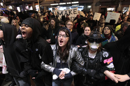 Protesters link arms