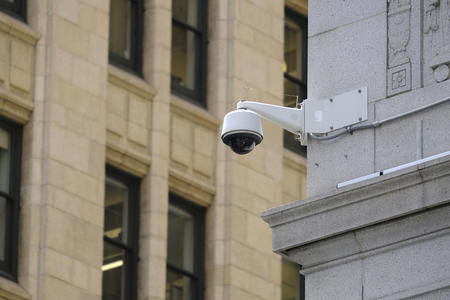 A camera attached to a building