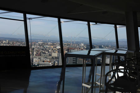 aerial view of seattle and mountains from space needle