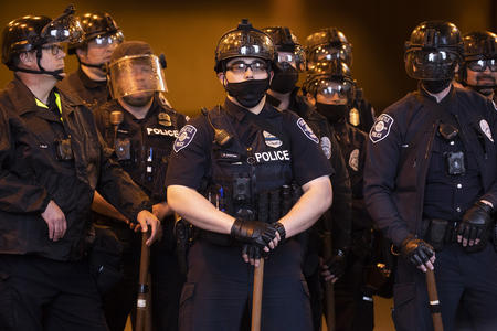 police in crowd control formation