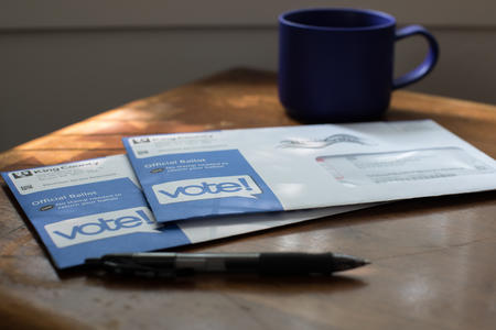 Two ballots on a table 