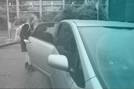 woman entering an Uber