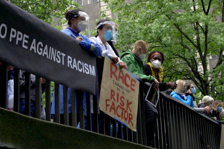 Medical workers rally against racial bias in medicine