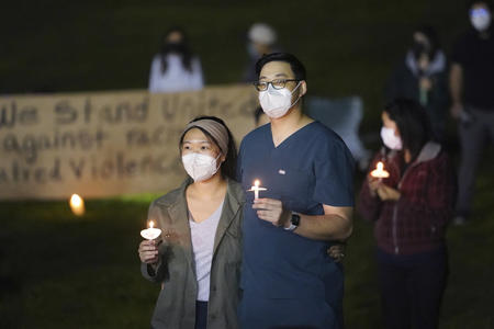 a woman and a an hold a candle