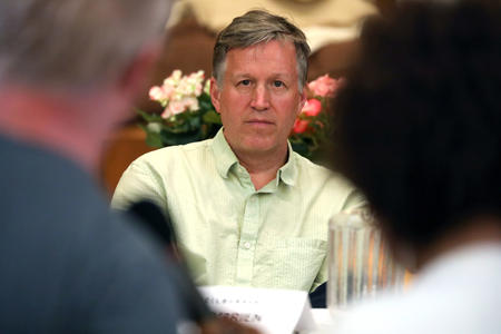 Seattle City Councilmember Mike O'Brien listens to angry constituents during a town hall meeting with Seattle City Council at Trinity United Methodist church in Seattle's Ballard neighborhood, May 2, 2018.