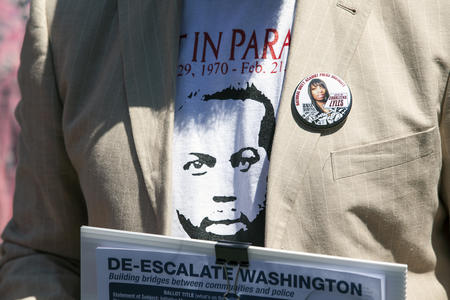 The image of Che Taylor on a T-shirt worn by his brother Andre Taylor. 