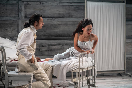 man and woman wearing white appear in distress