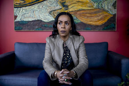 Sakara Remmu sits with her hands clasped in her lap