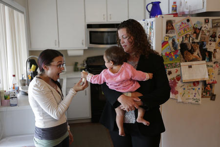Mother with nanny and child