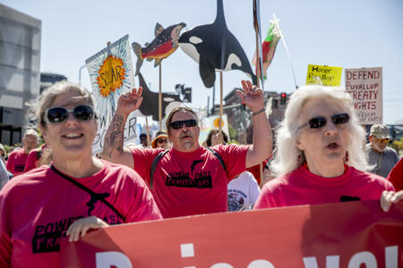 Puyallup tribal members and supporters march in protest against the Puget Sound Energy LNG project in downtown Tacoma on Aug. 27, 2019. (Photo by Dorothy Edwards/Crosscut)