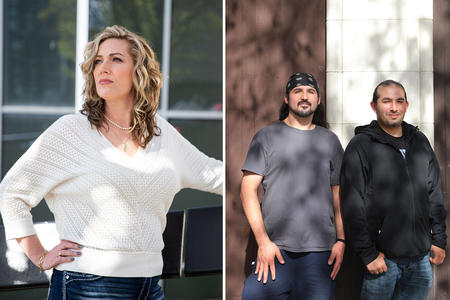 a woman and two men pose for a portrait