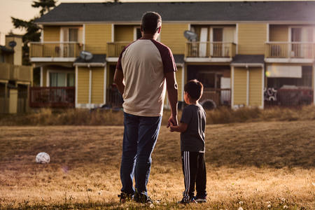 Edgar and his son at home.
