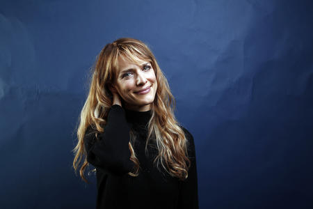 Lynn Shelton, a woman with long brown hair smiling sweetly at the camera