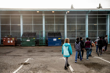 Kids lined up to play in a gym