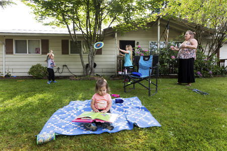 Children play on lawn