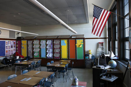 American flag hanging in a classroom