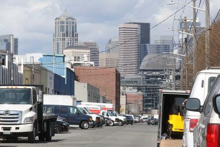 Cars cram the rights of way off Occidental Avenue, north of Landers Street, in Seattle's SODO neighborhood on Tuesday, April 2, 2018