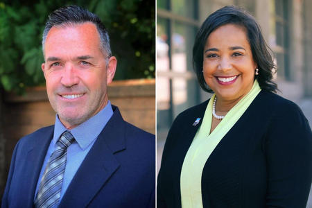 Steve Haverly in blue suit and tie at left, Victoria Woodards in black suit jacket over yellowish green blouse at right