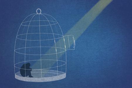A spotlight on a bird in a cage