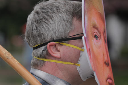 Protester wearing Trump mask