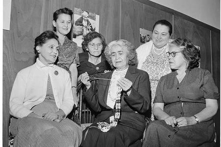  Martha John, center, demonstrates how to make a traditional shell to Leona Lyness, Dorothy Lombard, Ella Aquino, Pearl Warren, and Hazel Duarte