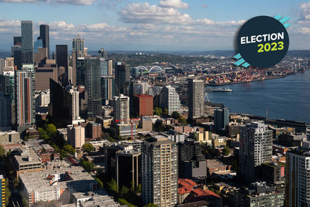 the seattle city skyline with a view of elliott bay in the background