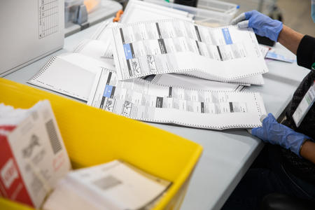 Ballots are sorted at King County Elections Office