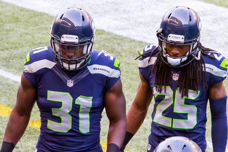 Retired Seahawks players Richard Sherman and Kam Chancellor