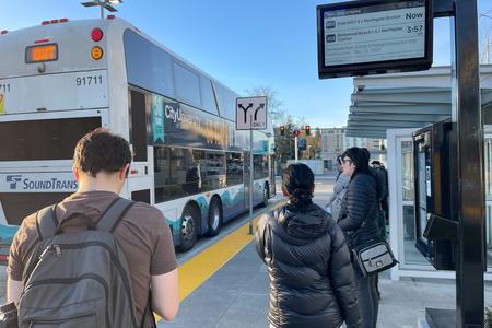 People waiting for their bus at the Northgate Transit Center in Seattle