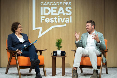 Hanna Rosin and Charlie Warzel sit on stage at the Cascade PBS Ideas Festival