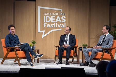 Malcolm Gladwell, Dr. Babak Sarani and David Hogg sit on stage at the Cascade PBS Ideas Festival