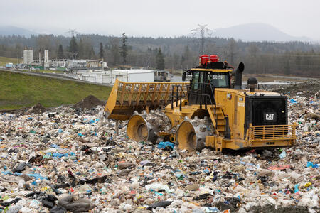 A compactor in the active area of the King County Cedar Hills Landfill. 