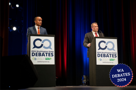 Nick Brown and Pete Serrano on the debate stage