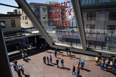 An ariel view of pedestrians in Pike Place Market. 