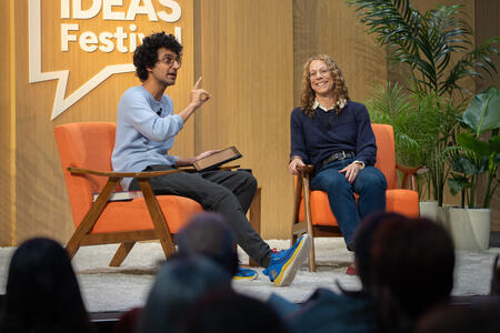 A crowd listens to the "Radiolab" session at the Cascade PBS Ideas Festival