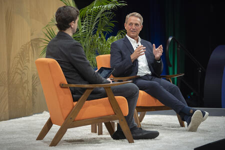 Jeff Flake sits onstage at the Cascade PBS Ideas Festival.