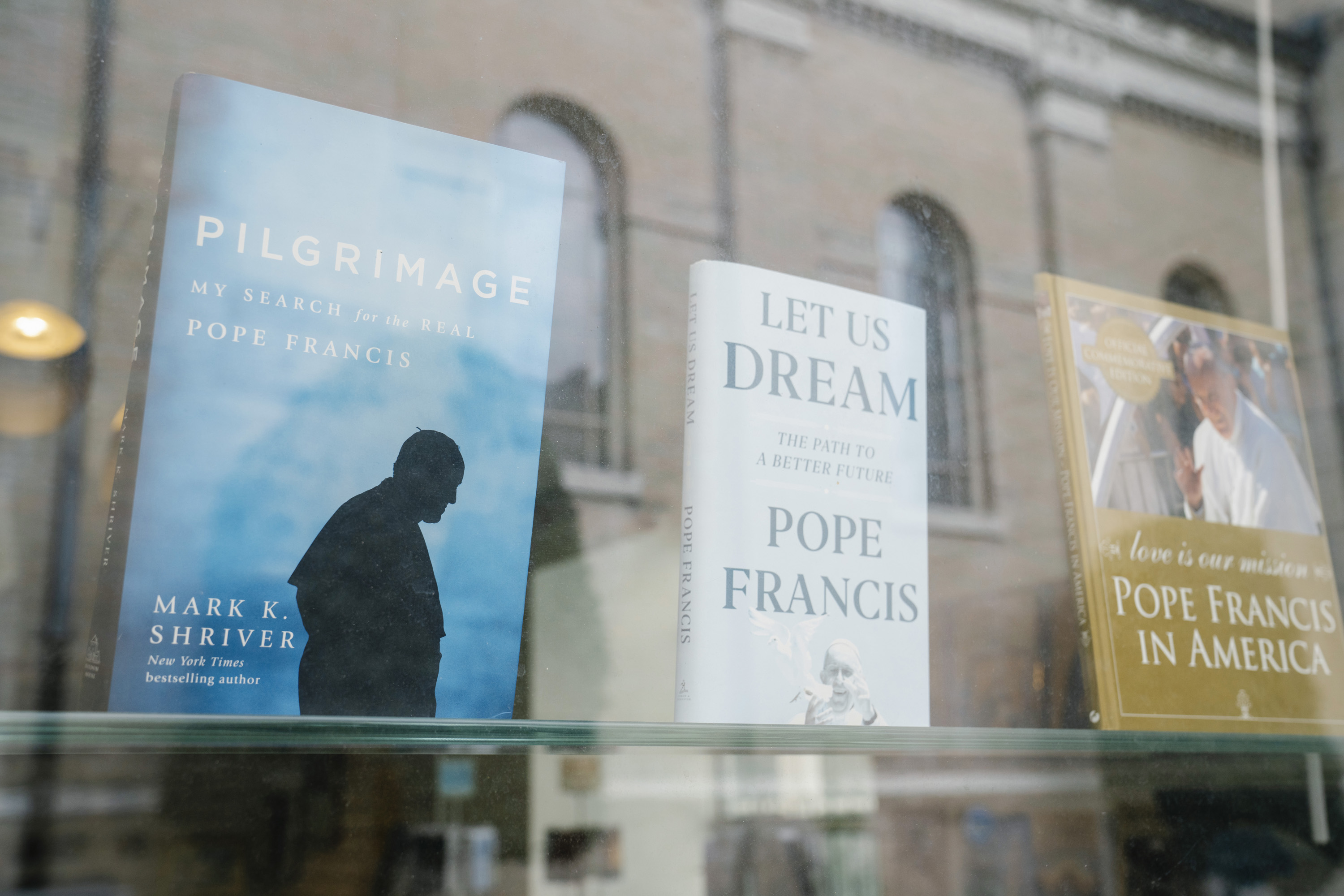 Books by and about Pope Francis are displayed in the St. James Cathedral Bookstore window in Seattle on Monday.